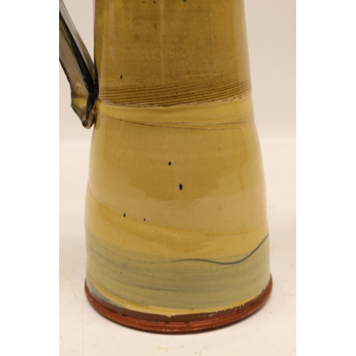 1086 - Richard Phethean, studio ceramic ewer jug, slipware, yellow and blue glaze, H37cm
Bradley's Shipping... 