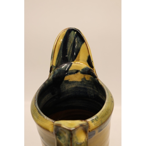 1086 - Richard Phethean, studio ceramic ewer jug, slipware, yellow and blue glaze, H37cm
Bradley's Shipping... 