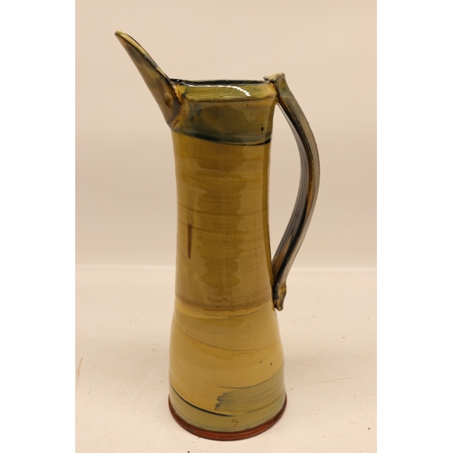 1086 - Richard Phethean, studio ceramic ewer jug, slipware, yellow and blue glaze, H37cm
Bradley's Shipping... 