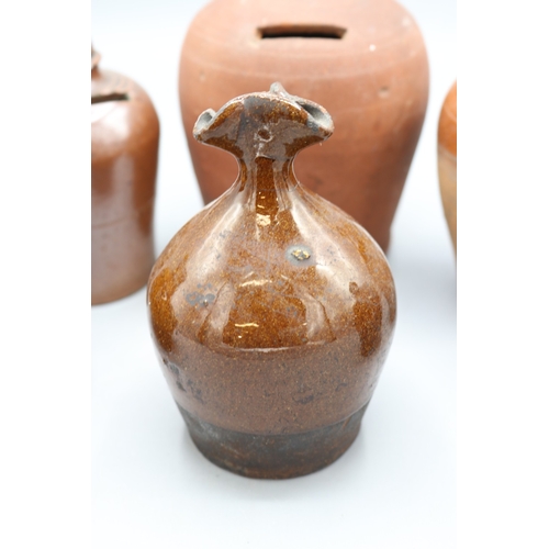 1035 - Slipware and Earthenware money boxes, incl. Early 19th Century slipware money box, globular form wit... 