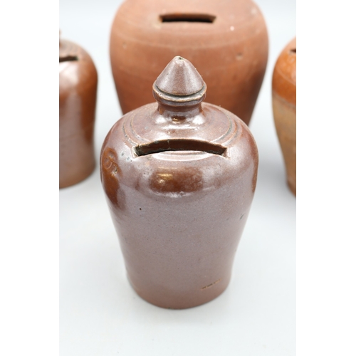 1035 - Slipware and Earthenware money boxes, incl. Early 19th Century slipware money box, globular form wit... 