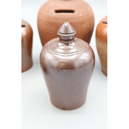 1035 - Slipware and Earthenware money boxes, incl. Early 19th Century slipware money box, globular form wit... 