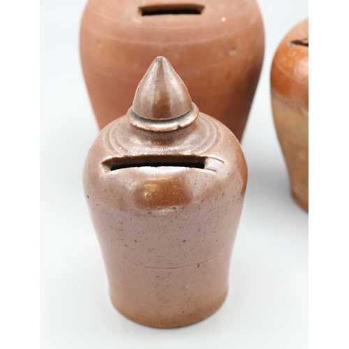 1035 - Slipware and Earthenware money boxes, incl. Early 19th Century slipware money box, globular form wit... 