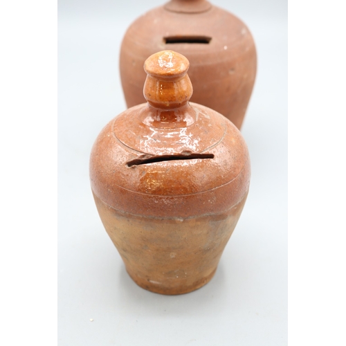 1035 - Slipware and Earthenware money boxes, incl. Early 19th Century slipware money box, globular form wit... 