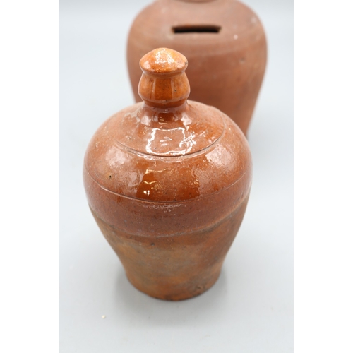 1035 - Slipware and Earthenware money boxes, incl. Early 19th Century slipware money box, globular form wit... 