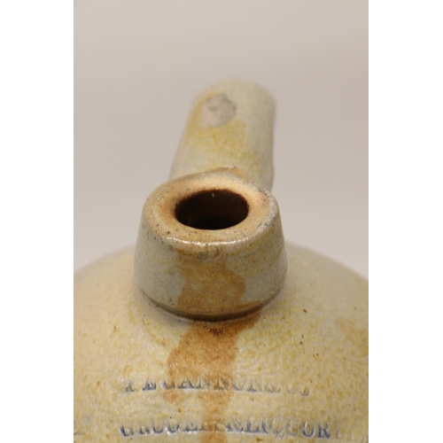 1078 - Stoneware flagon, rubbed impressed mark to neck 'I.E. Gannon Grooers & Liquor Wholesaler', painted b... 