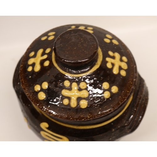 1057 - Slipware tobacco jar, twin handled, partially glazed, squiggle patterns, missing lid; slipware tray ... 