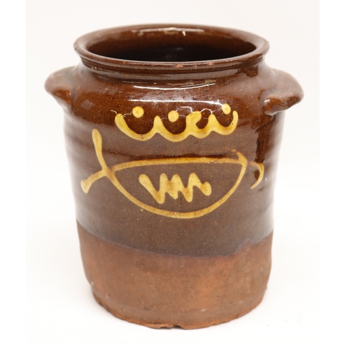 1057 - Slipware tobacco jar, twin handled, partially glazed, squiggle patterns, missing lid; slipware tray ... 