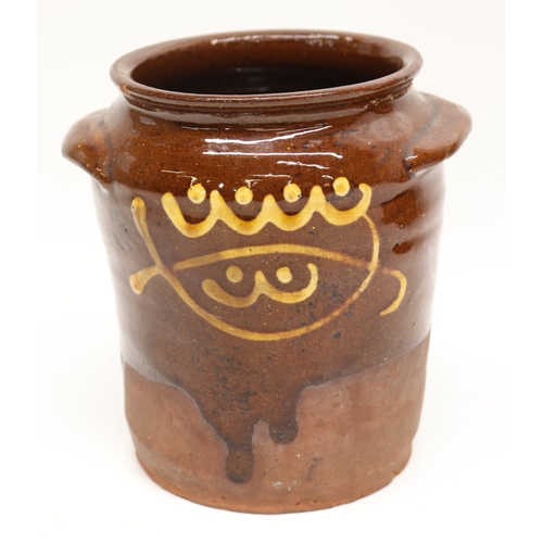 1057 - Slipware tobacco jar, twin handled, partially glazed, squiggle patterns, missing lid; slipware tray ... 