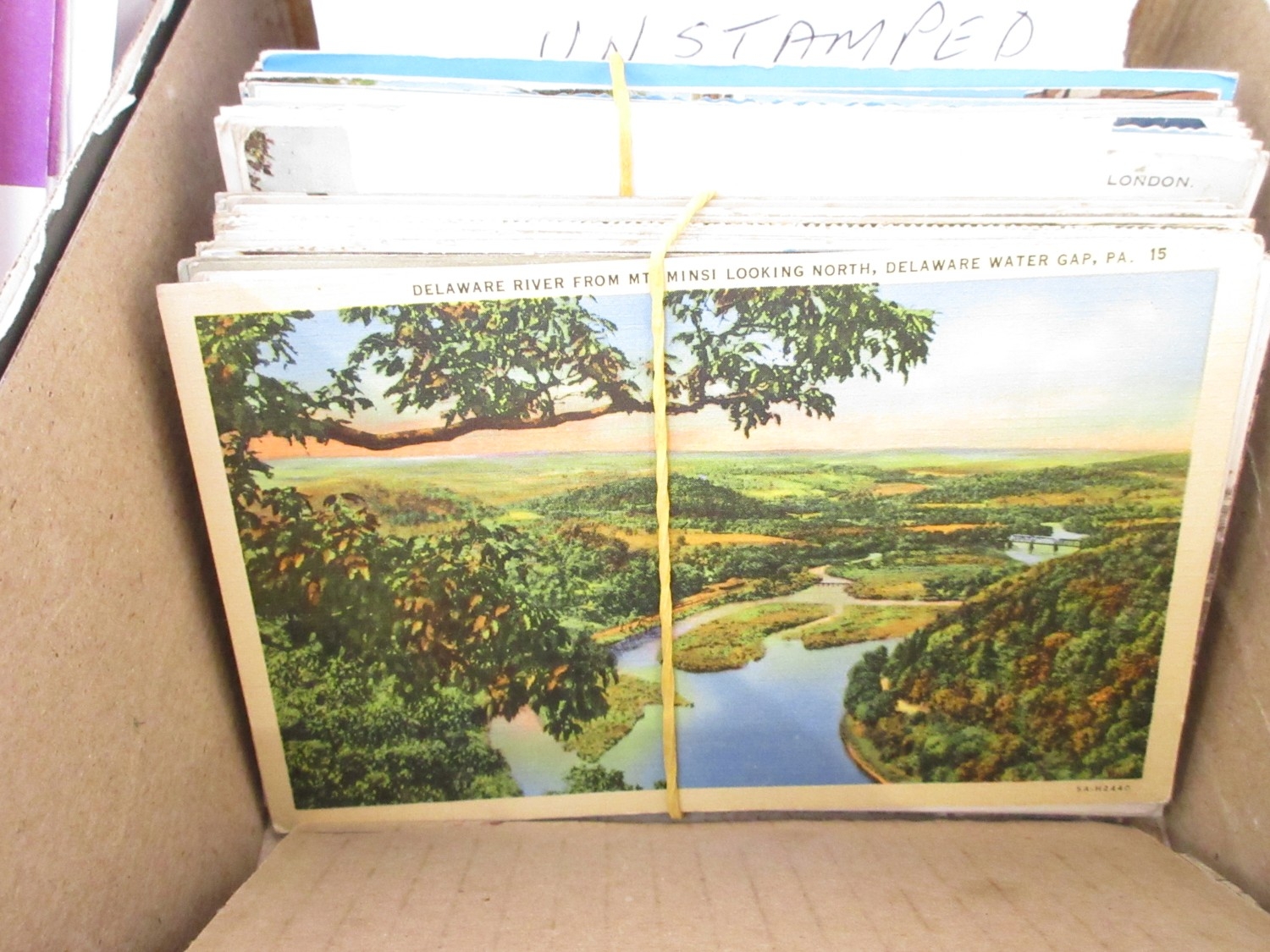 Small collection of assorted postcards covering topographical and ...