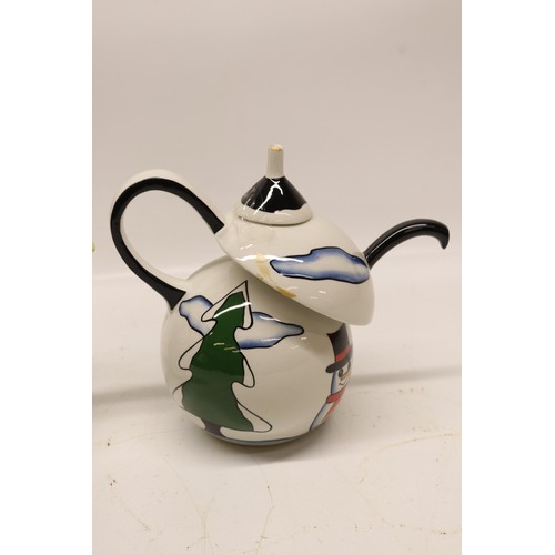 849 - Lorna Bailey The Snowman teapot, limited edition No.7/75, decorated holding a lantern and broom wear... 