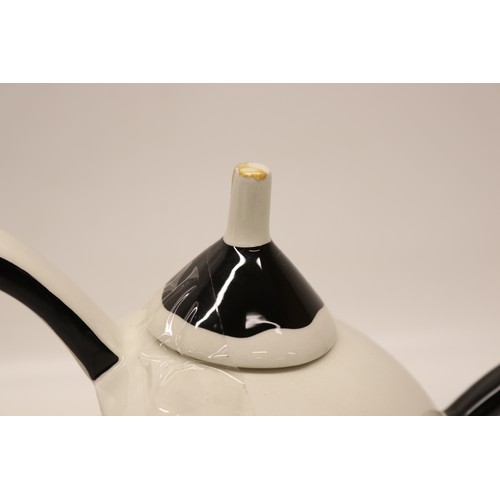 849 - Lorna Bailey The Snowman teapot, limited edition No.7/75, decorated holding a lantern and broom wear... 