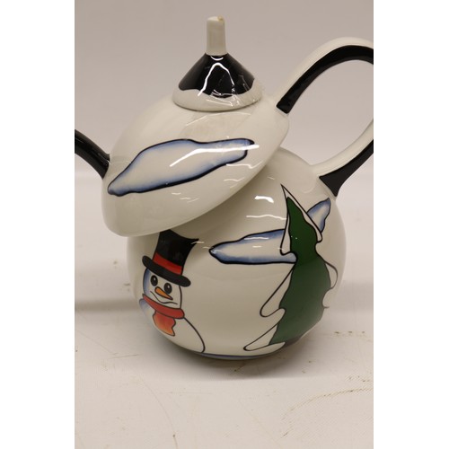 849 - Lorna Bailey The Snowman teapot, limited edition No.7/75, decorated holding a lantern and broom wear... 