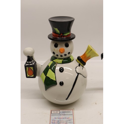 849 - Lorna Bailey The Snowman teapot, limited edition No.7/75, decorated holding a lantern and broom wear... 