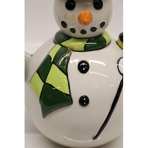 849 - Lorna Bailey The Snowman teapot, limited edition No.7/75, decorated holding a lantern and broom wear... 