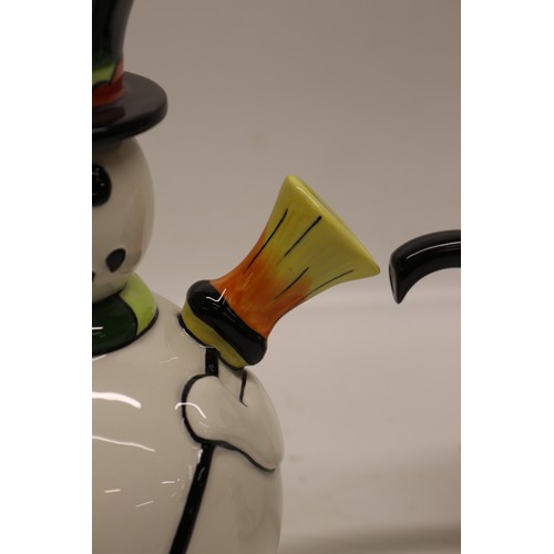 849 - Lorna Bailey The Snowman teapot, limited edition No.7/75, decorated holding a lantern and broom wear... 