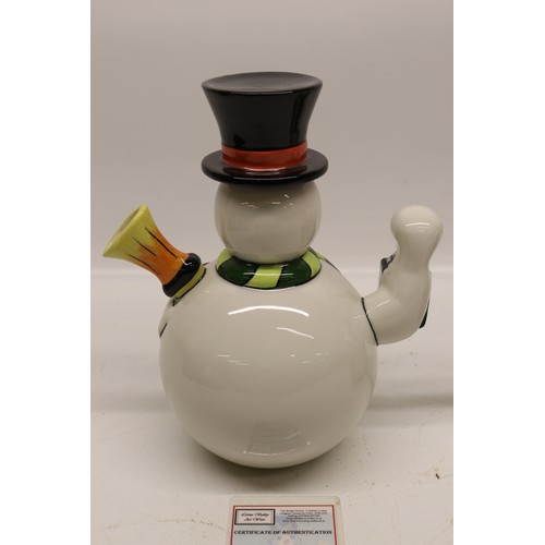 849 - Lorna Bailey The Snowman teapot, limited edition No.7/75, decorated holding a lantern and broom wear... 