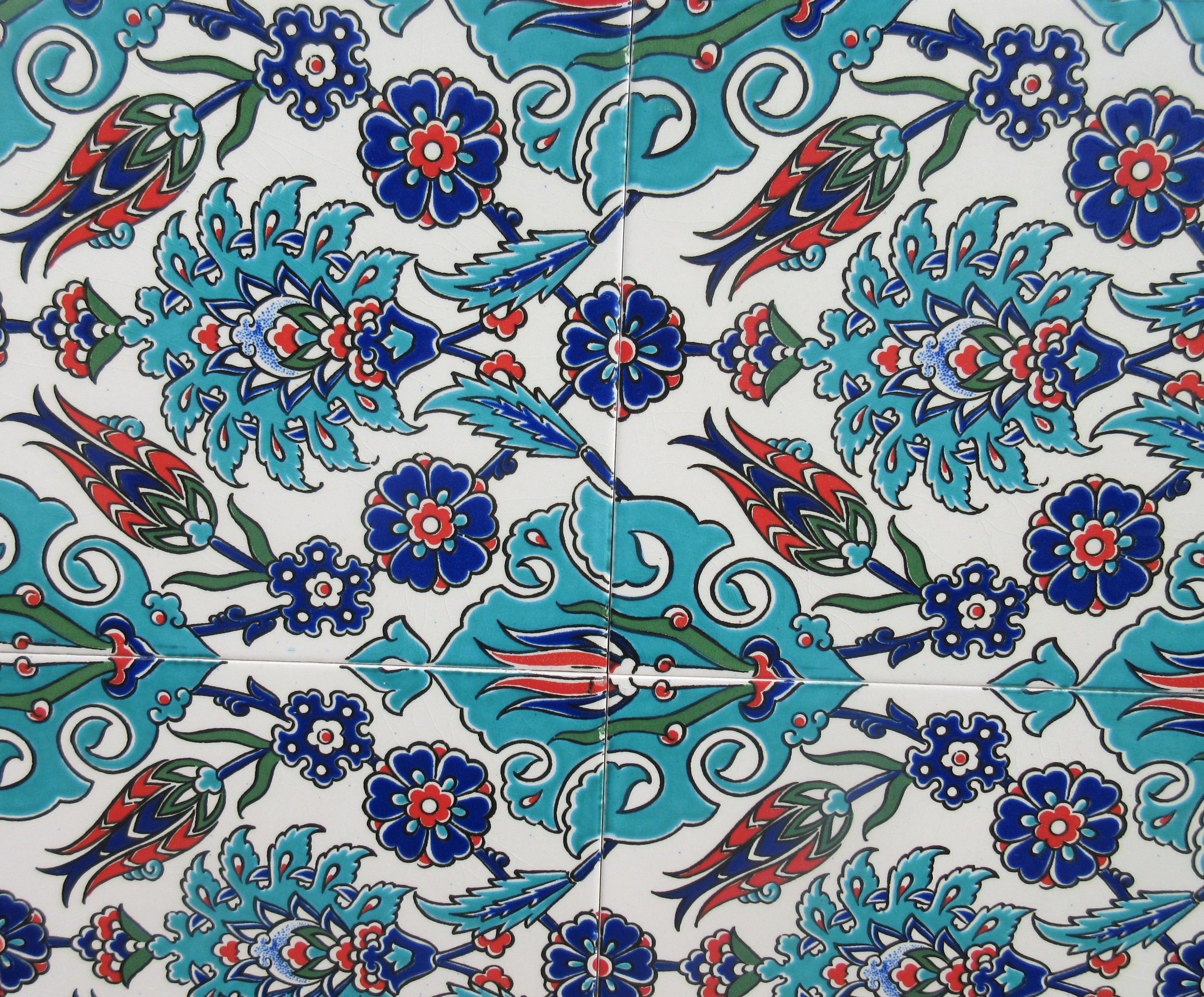 Two framed pieces of Isnic ceramics tiles, with repeating detail ...