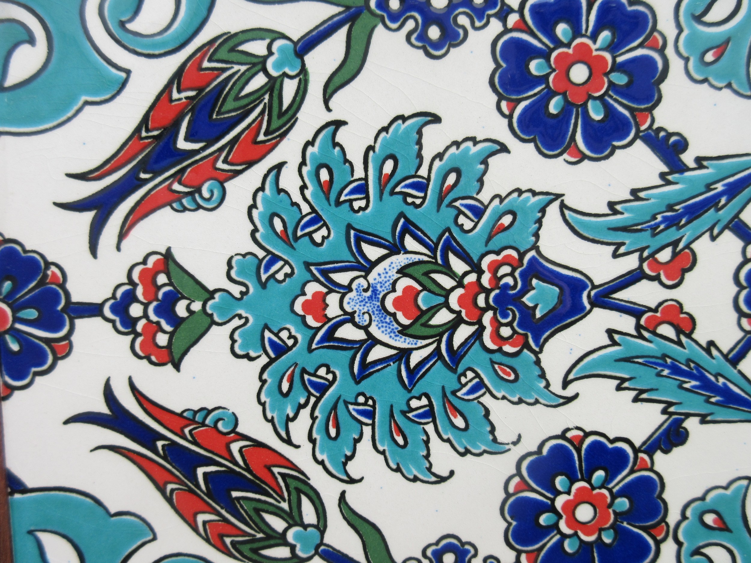 Two framed pieces of Isnic ceramics tiles, with repeating detail ...