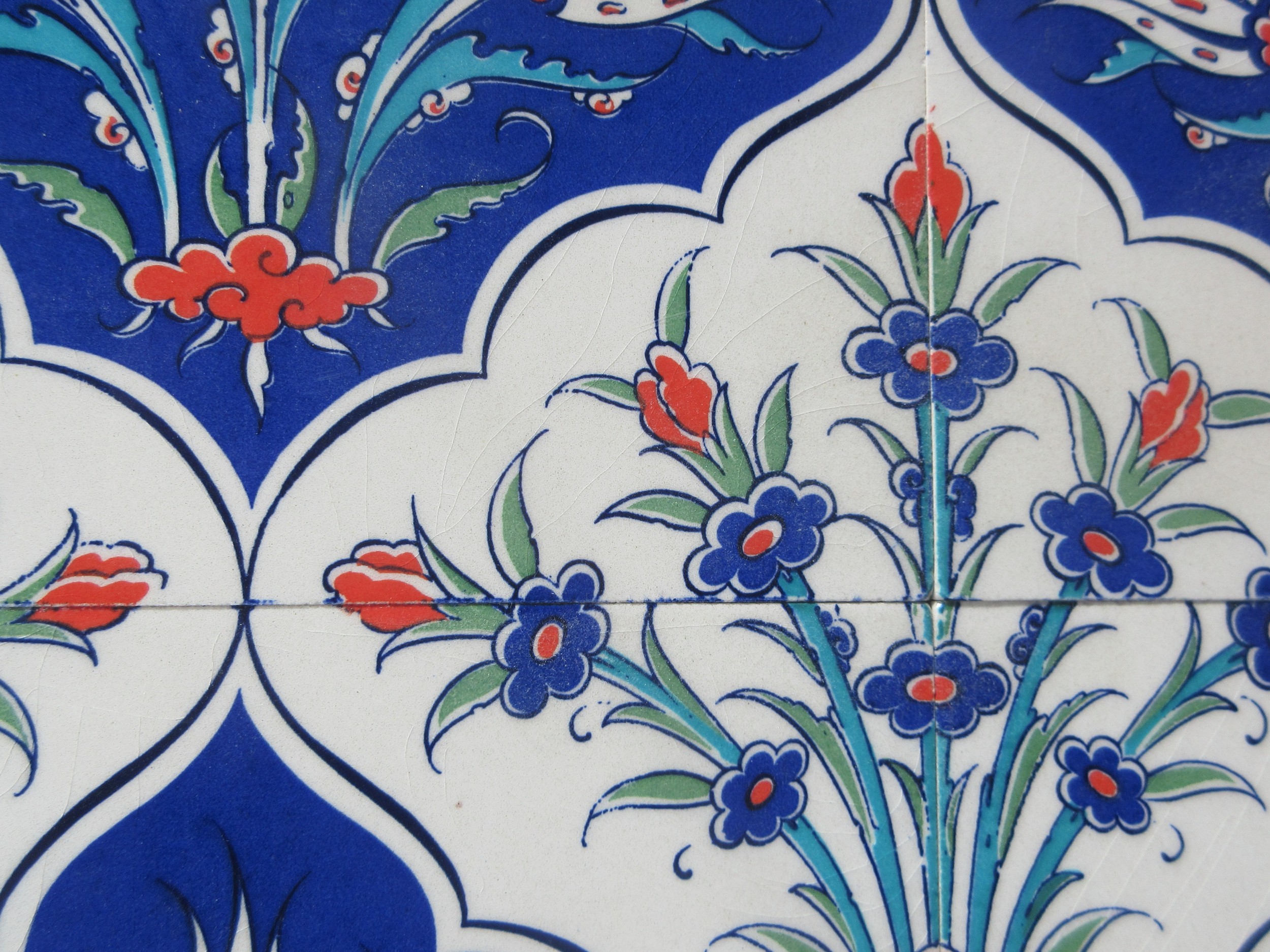 Two framed pieces of Isnic ceramics tiles, with repeating detail ...
