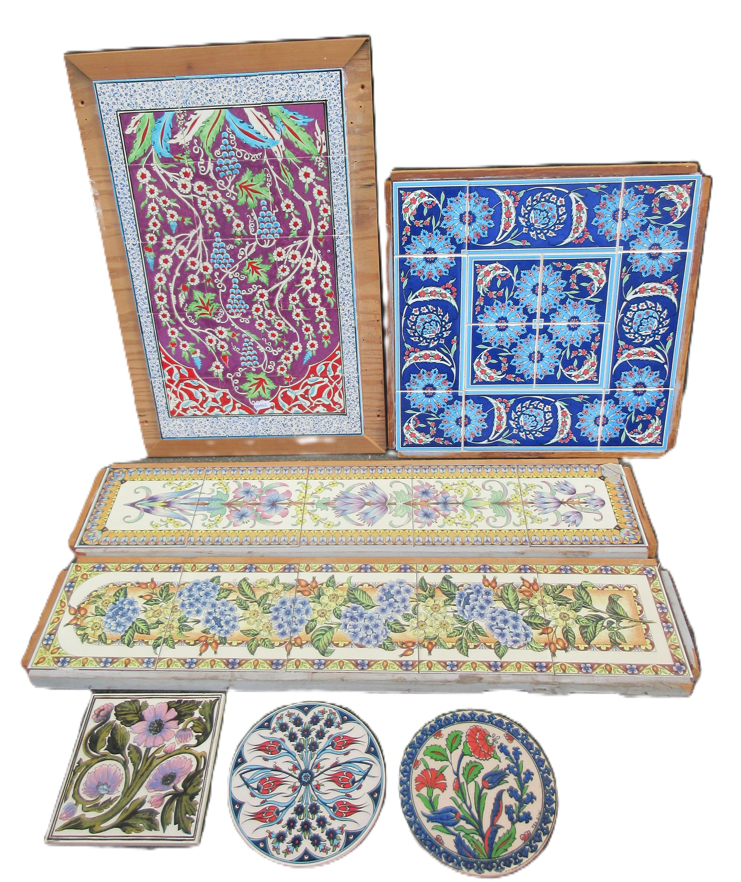 Four framed pieces of Isnic ceramics tiles, with repeating detail ...