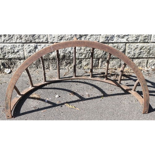 Selection of wrought iron wall-mount hay racks; featuring curved bars ...