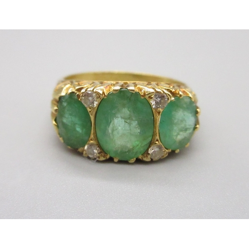 6 - 18ct hallmarked emerald and diamond ring, comprising 3 emeralds and 4 small diamonds, size P (6.6g)
... 