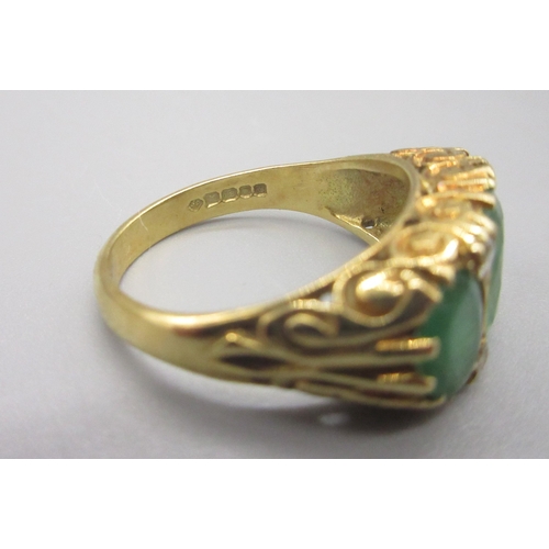 6 - 18ct hallmarked emerald and diamond ring, comprising 3 emeralds and 4 small diamonds, size P (6.6g)
... 