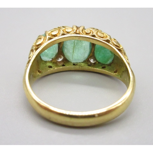 6 - 18ct hallmarked emerald and diamond ring, comprising 3 emeralds and 4 small diamonds, size P (6.6g)
... 