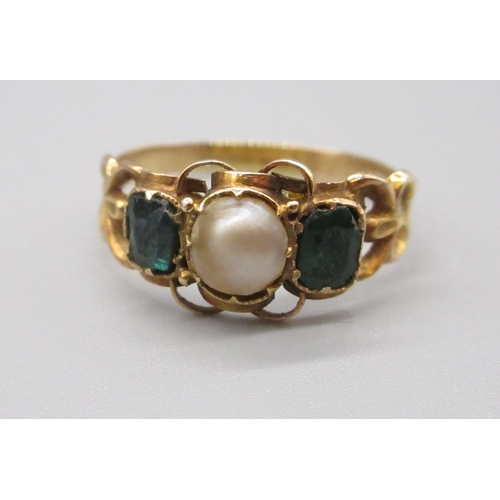 7 - Yellow metal 3 stone ring comprising 2 dark green stones and a pearl colour stone, size M 1/2 (1.3g)... 