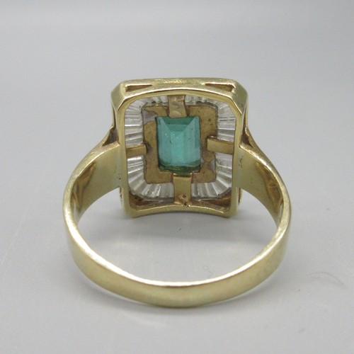 8 - 18ct yellow gold natural emerald and diamond cocktail ring, central baguette cut emerald in bezel se... 