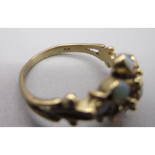 9 - Yellow metal 9 Opal stone cluster ring, Size I (2g)
Bradley's Shipping £20.00 plus vat (UK Only)