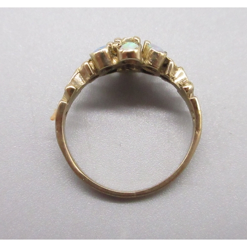 9 - Yellow metal 9 Opal stone cluster ring, Size I (2g)
Bradley's Shipping £20.00 plus vat (UK Only)