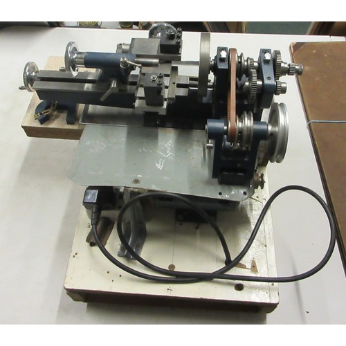 1436 - Cowells Clockmakers metalworking lathe with original electric motor and tabletop stand, loose clock ... 