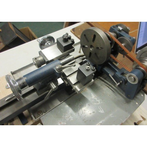 1436 - Cowells Clockmakers metalworking lathe with original electric motor and tabletop stand, loose clock ... 