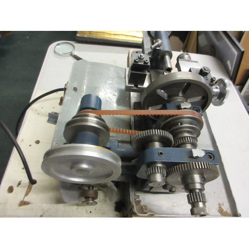 1436 - Cowells Clockmakers metalworking lathe with original electric motor and tabletop stand, loose clock ... 