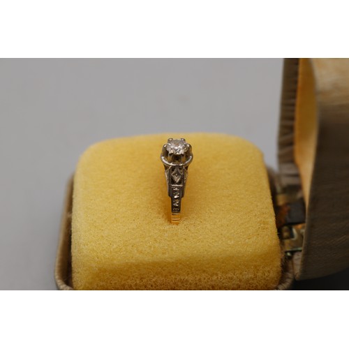 13 - 18ct hallmarked diamond solitaire ring with a white gold head, set with a single round-cut diamond i... 