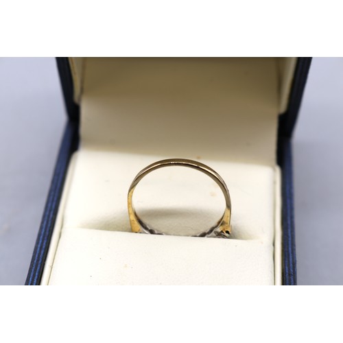 14 - Two mid century gold rings featuring 1x hallmarked 18ct yellow gold diamond trilogy ring approximate... 