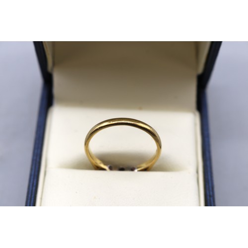 14 - Two mid century gold rings featuring 1x hallmarked 18ct yellow gold diamond trilogy ring approximate... 