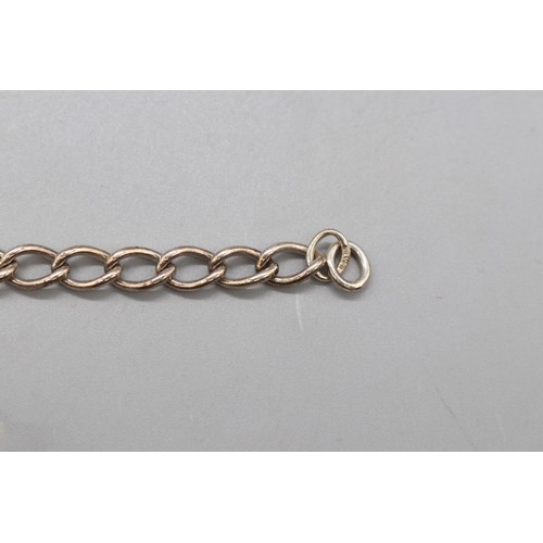 18 - Mixed silver and white metal items comprising a hallmarked silver curb link bracelet with padlock cl... 