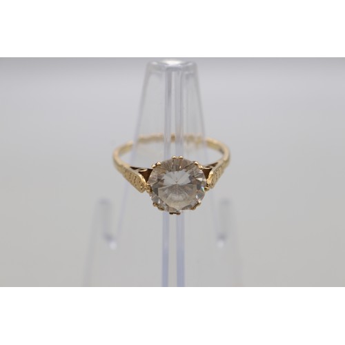 19 - 9ct stamped yellow gold white non precious round brilliant cut stone solitaire cocktail ring with en... 