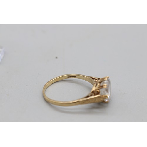 19 - 9ct stamped yellow gold white non precious round brilliant cut stone solitaire cocktail ring with en... 