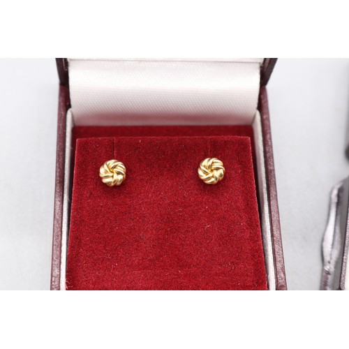 24 - Mixed lot comprising a hallmarked 9ct yellow gold engraved locket, weight 1.34g; a pair of small yel... 