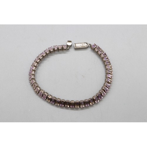 27 - Lot of three contemporary tennis bracelets comprising a two-tone gold-plated sterling silver diamond... 