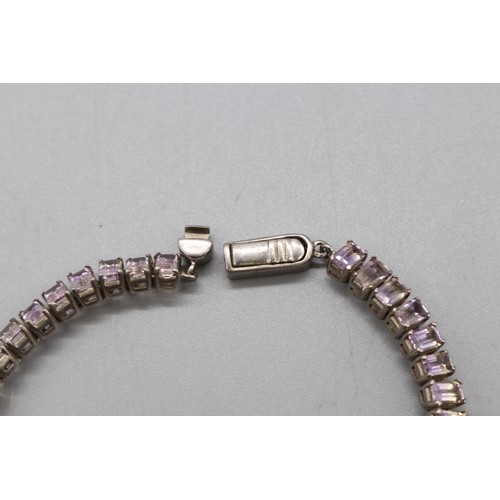 27 - Lot of three contemporary tennis bracelets comprising a two-tone gold-plated sterling silver diamond... 