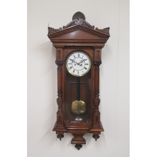 376 - Gustav Becker type 8 day walnut Vienna wall clock, arched pediment over full length glazed door flan... 