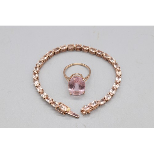 28 - Lot comprising a stamped contemporary 14ct rose gold four-claw-set large solitaire morganite ring, r... 