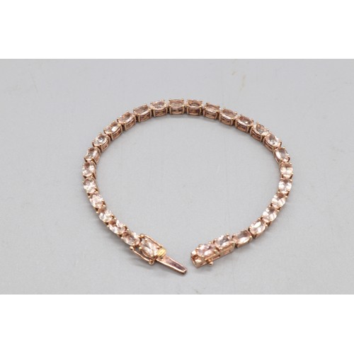 28 - Lot comprising a stamped contemporary 14ct rose gold four-claw-set large solitaire morganite ring, r... 