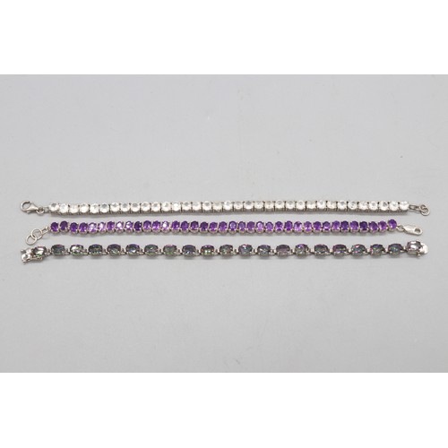29 - Lot of three contemporary bracelets comprised of 1 round brilliant cut white topaz hallmarked sterli... 