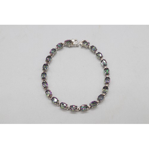 29 - Lot of three contemporary bracelets comprised of 1 round brilliant cut white topaz hallmarked sterli... 